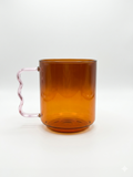 Amber Glass Mug with Pink Wavy Handle